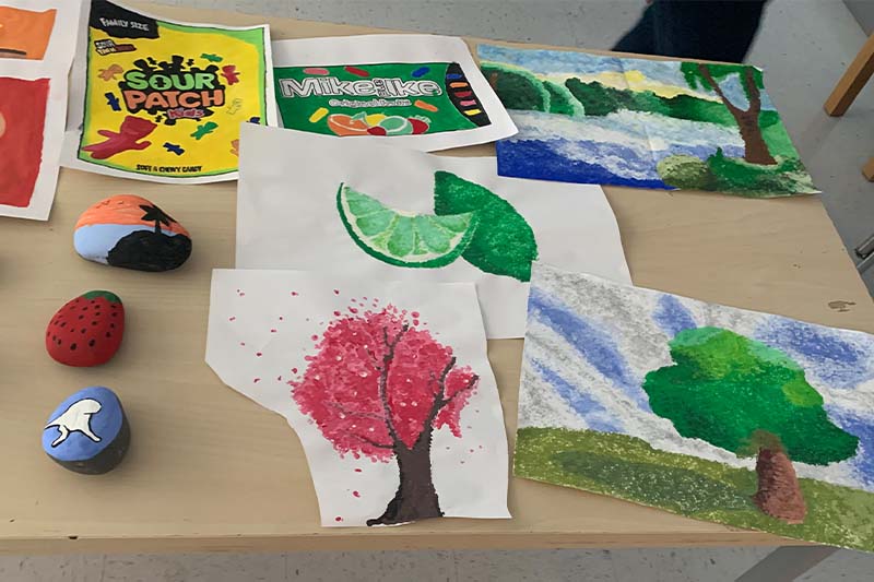 paintings of trees and limes on table